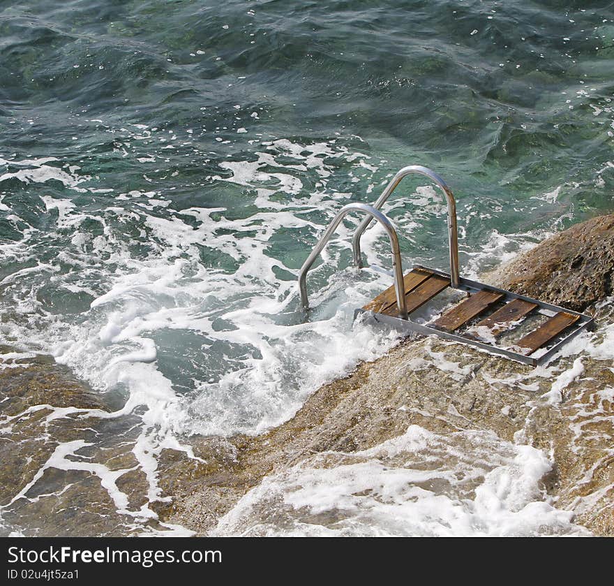 Sea, rocks and a private gateaway into the ocean. Sea, rocks and a private gateaway into the ocean