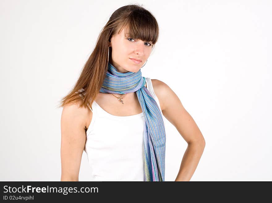 Girl in ethnic clothes posing in studio