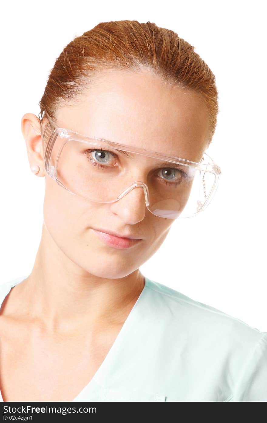 Portrait of female doctor in goggles