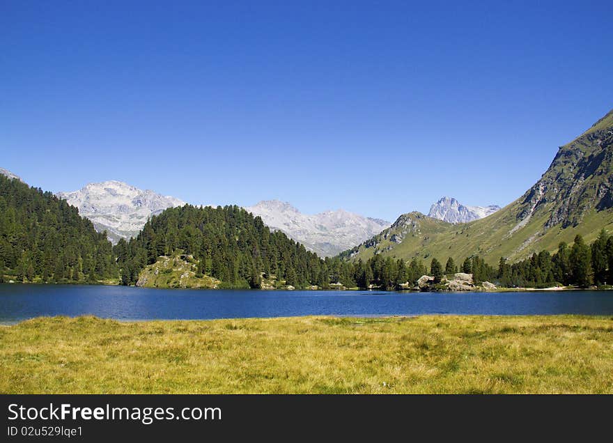 Alpine lake Cavloc Engadine in Switzerland