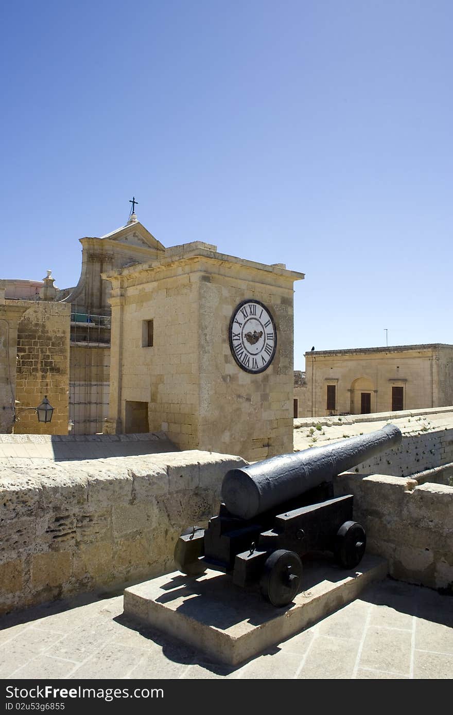 Malta, gozo island, cannon and clock