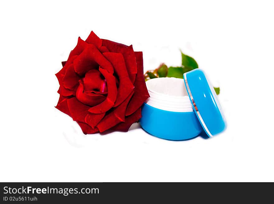 Face cream and red roses