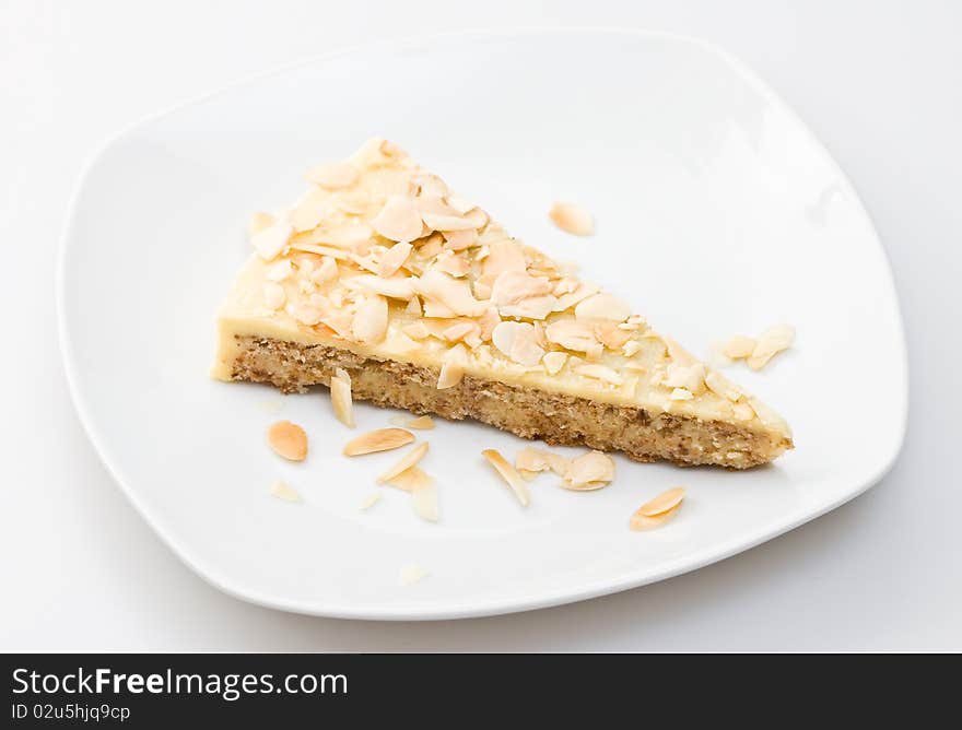 A piece of traditioanal almond cake on a plate