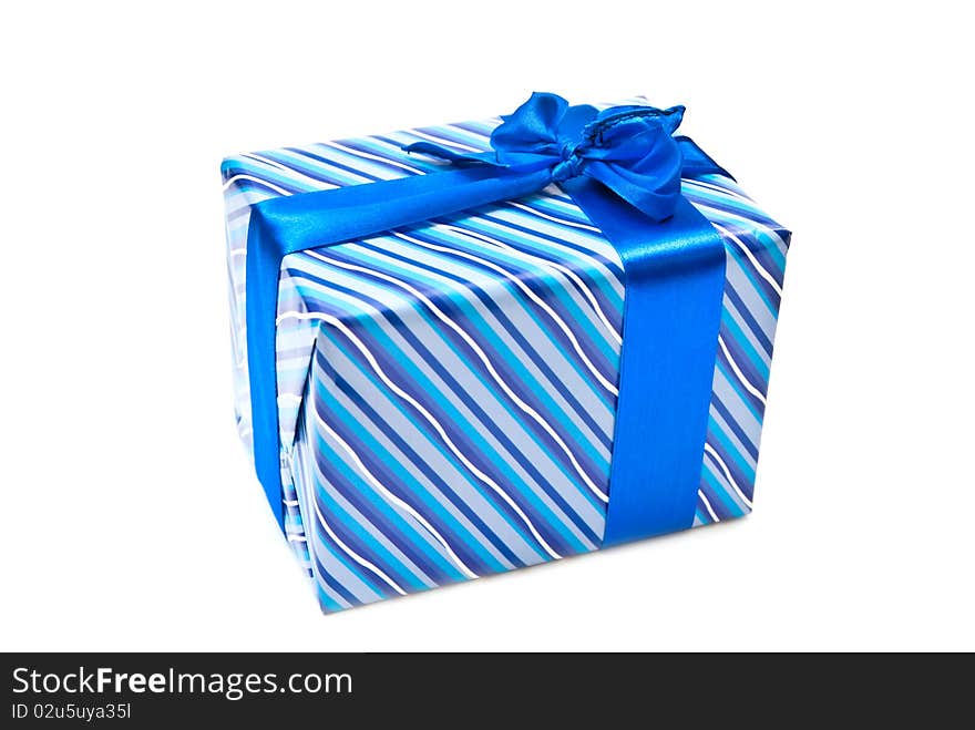 Blue paper gift box with bow. Isolated on white.