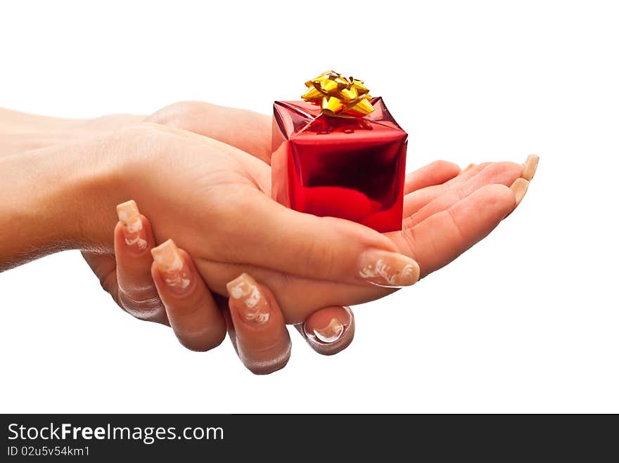 Small red present in woman's hands. Isolated on white. Small red present in woman's hands. Isolated on white