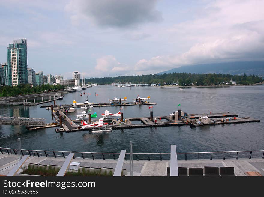 Sea charter tourist planes parked on the water in Vancouver BC Canada. Sea charter tourist planes parked on the water in Vancouver BC Canada.