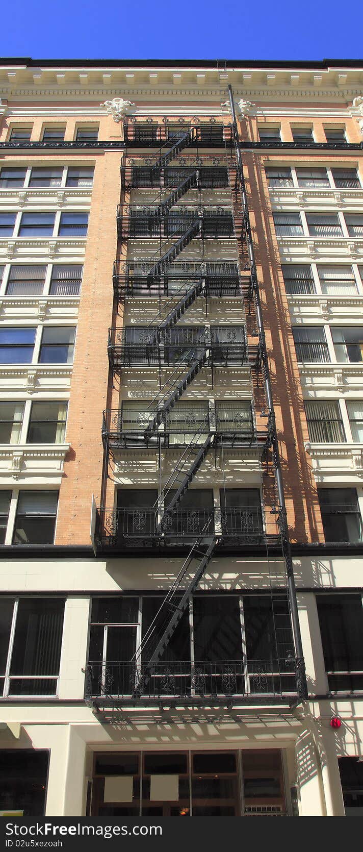 Fire escape ladders on a building in downtown Portland Oregon. Fire escape ladders on a building in downtown Portland Oregon.