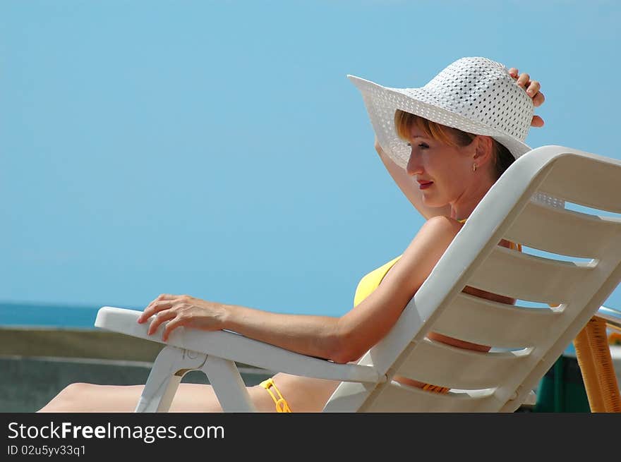 Portrait of woman on chaise longue