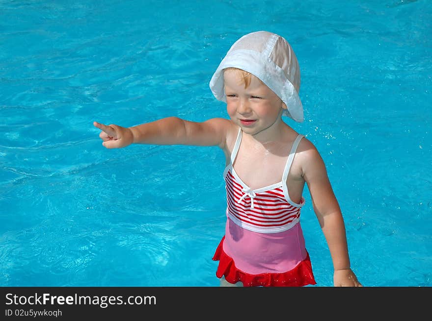 The little girl in swimming pool