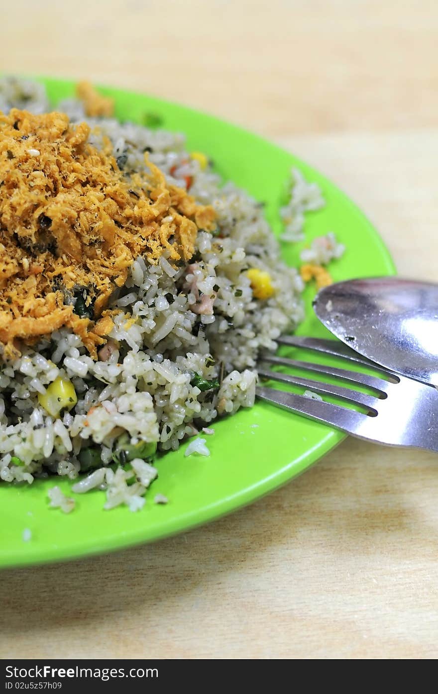 Asian vegetable olive fried rice with pork floss topping. Suitable for concepts such as diet and nutrition, healthy lifestyle, and food and beverage. Asian vegetable olive fried rice with pork floss topping. Suitable for concepts such as diet and nutrition, healthy lifestyle, and food and beverage.