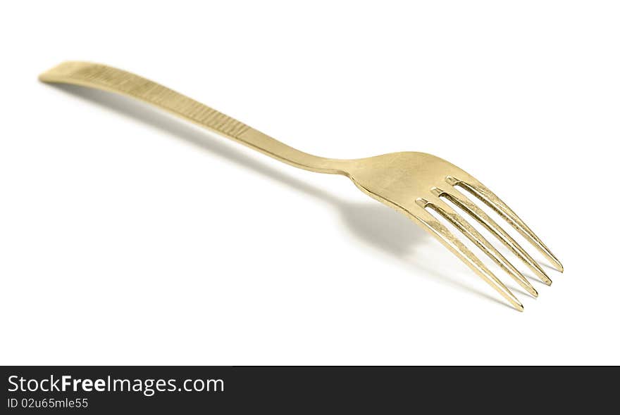 Golden fork isolated on white background