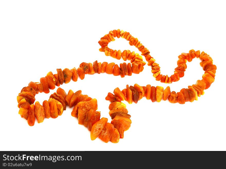 Jewel amber. Necklace isolated on a white background. Jewel amber. Necklace isolated on a white background