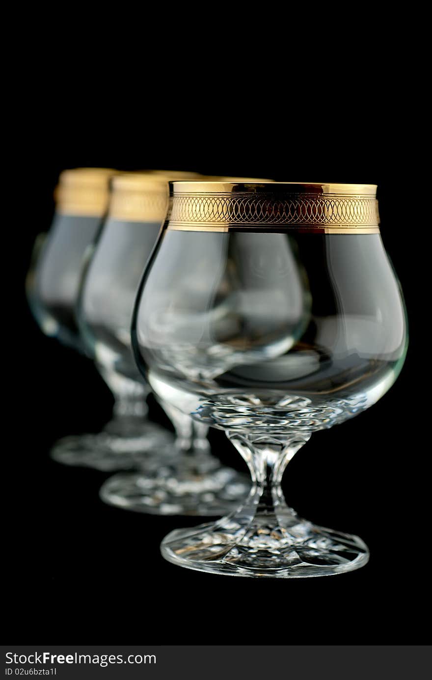 Studio shot of Glass of liqour on black background. Studio shot of Glass of liqour on black background.