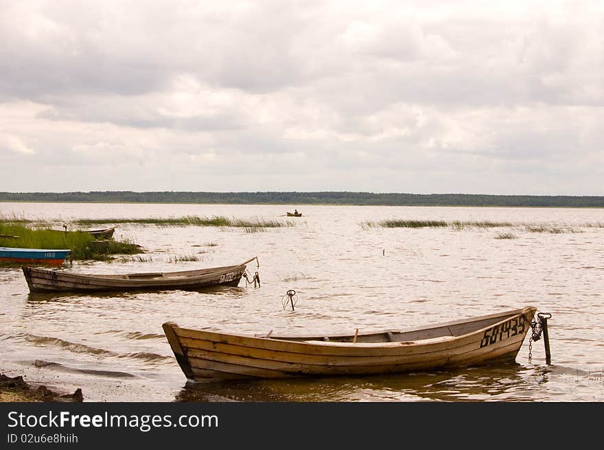 Boats on the lake coast. Boats on the lake coast