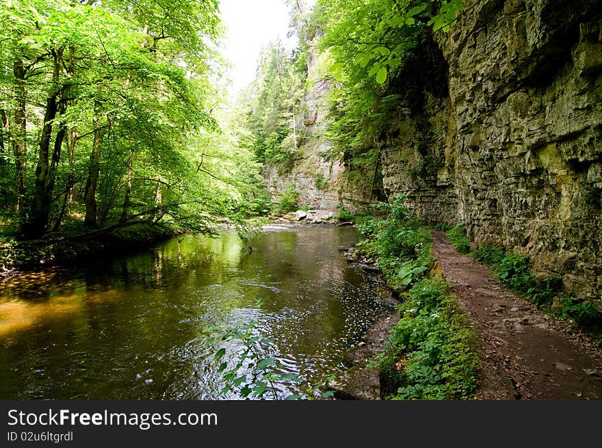 Trail in the Black Forest between river and rocks. Trail in the Black Forest between river and rocks