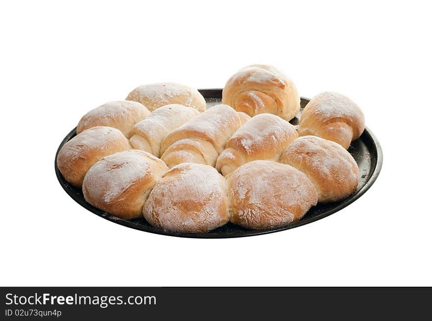 Loaves of bread on a black pan. Loaves of bread on a black pan