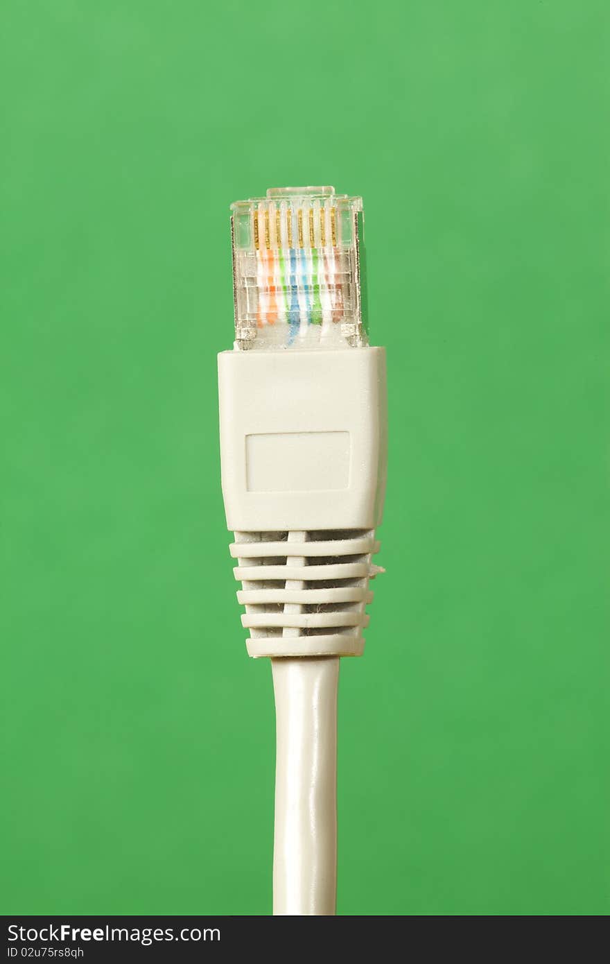 Close up of Ethernet Cable on a green background