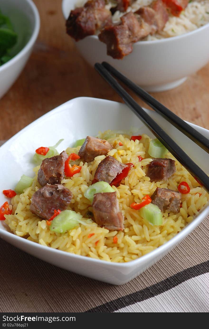 Diced pork with rice in a bowl