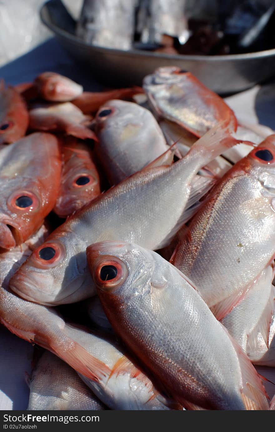 Red bigeye fish on an asian market stall