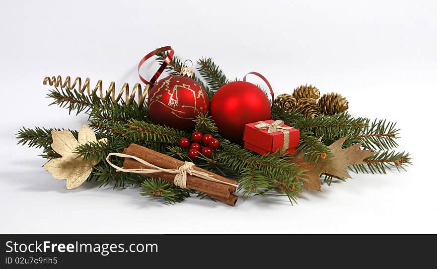 Christmas decoration with the twigs of the spruce and baubles