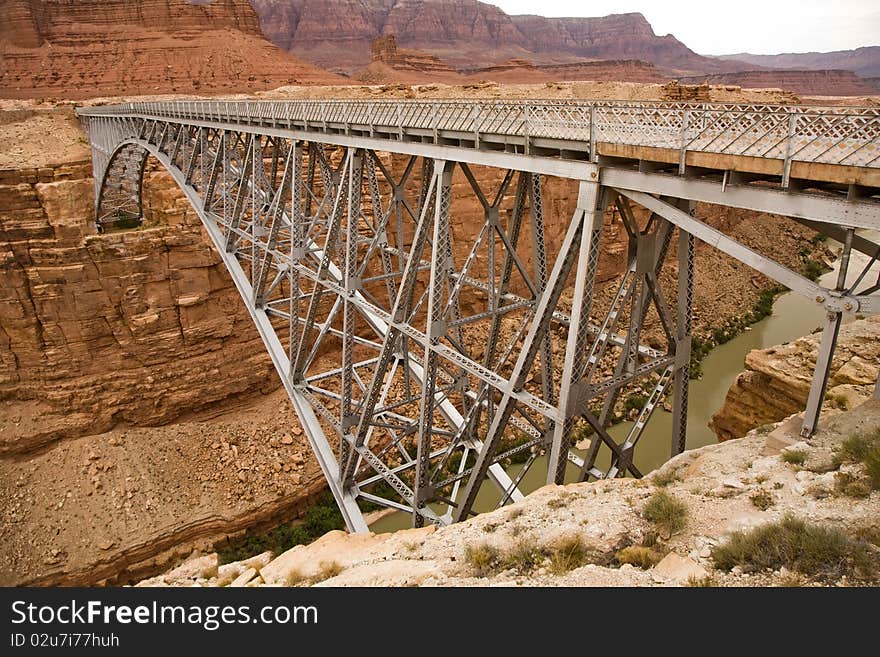 Old Navajo Bridge spanning the  Colorado at Marble Canyon. Old Navajo Bridge spanning the  Colorado at Marble Canyon