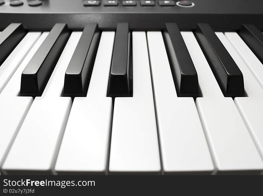 Close up shot of black & white piano keys