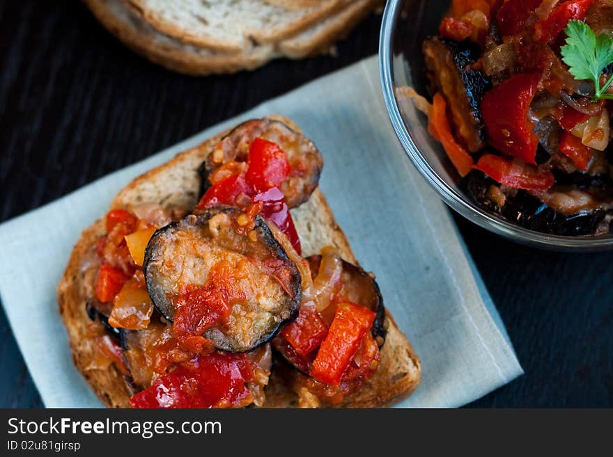 Toasted bread with vegetable ragout. Toasted bread with vegetable ragout