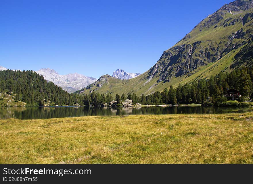 Alpine lake Cavloc Engadine in Switzerland