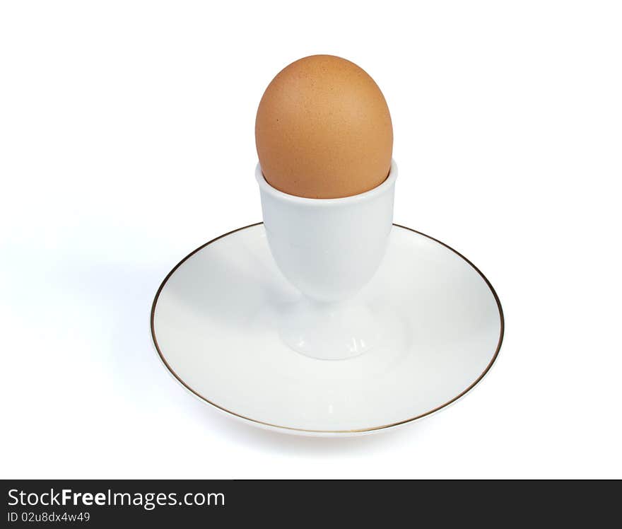 Egg in white eggcup