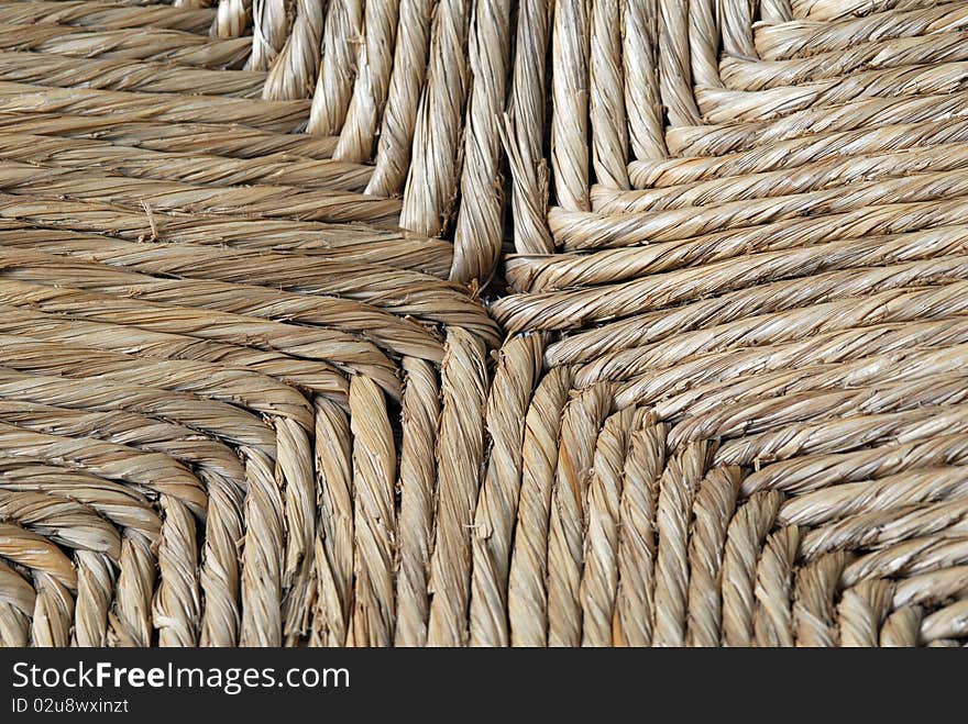 Close up of woven rattan chair seat