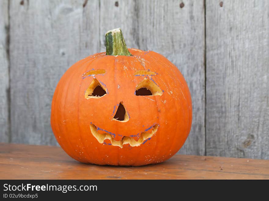 Halloween pumpkin on the bench