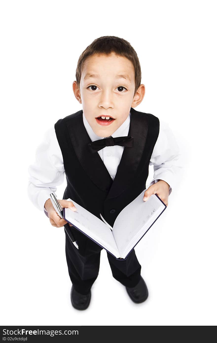 Boy holding pen and book