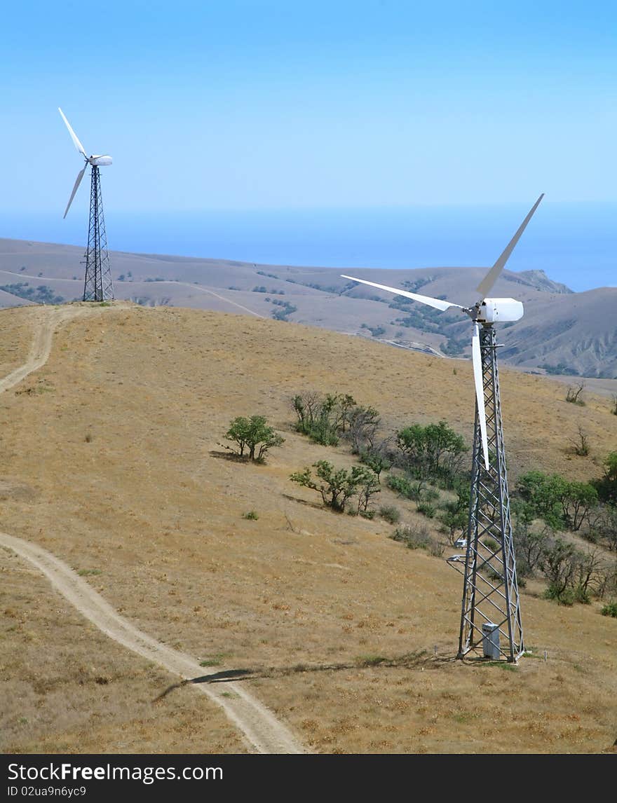 Landscape with wind turbines in the mountains.