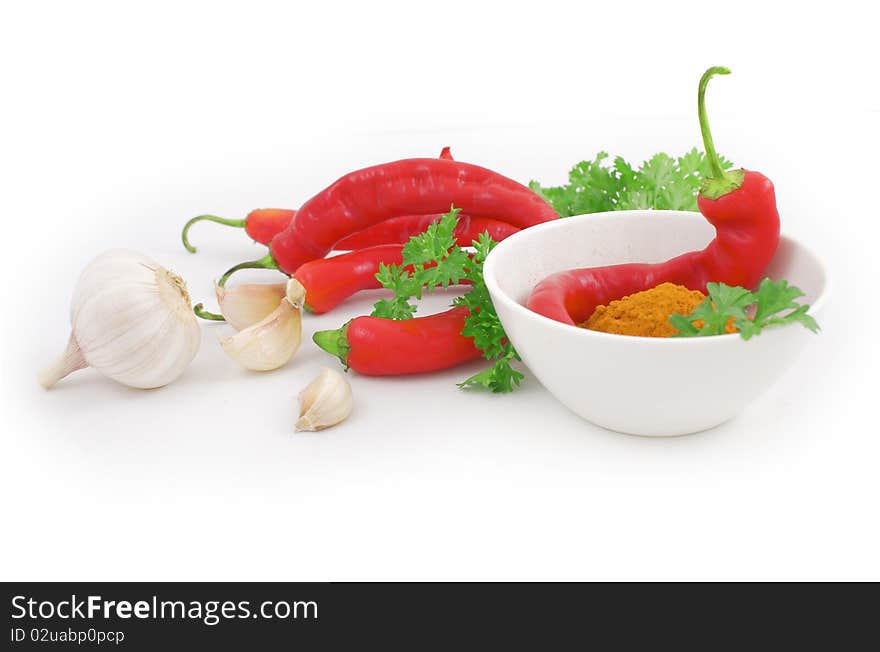 Nice fresh spices, greens and vegetables isolated on white background with clipping path