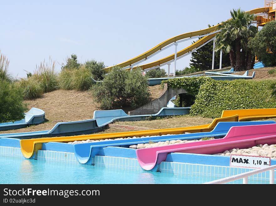 Colored slides in the water park. Colored slides in the water park