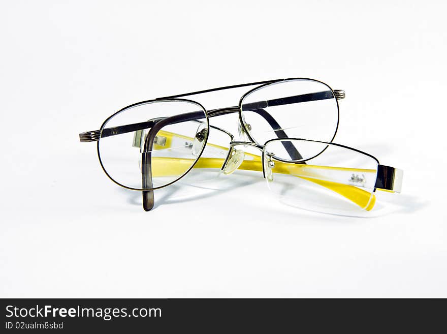 Two spectacles on white background