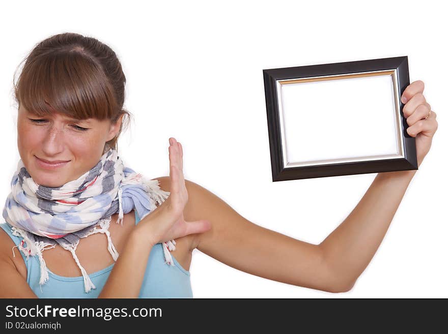 Unhappy woman with photo frame - isolated over white background