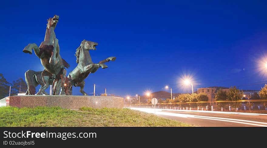 Three horses sculpture