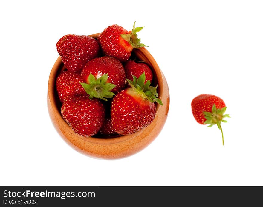 The red strawberries in a pot. The red strawberries in a pot