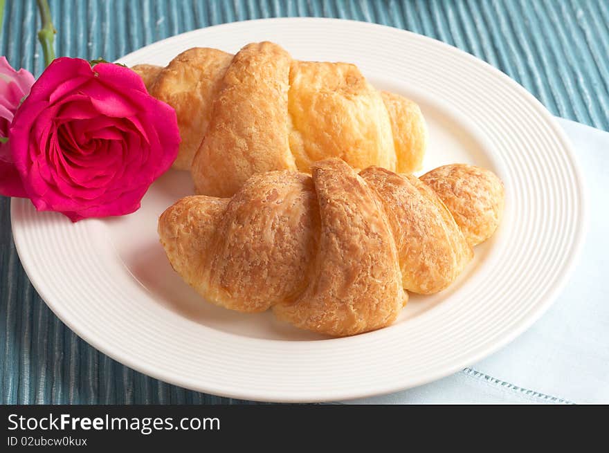 Croissant with roses