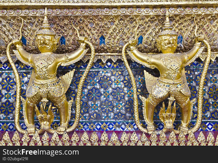 Garuda two gold color in the Temple of the Emerald Buddha , Bangkok , Thailand ,