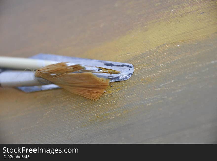 Set of bristles over paint smudges. Set of bristles over paint smudges