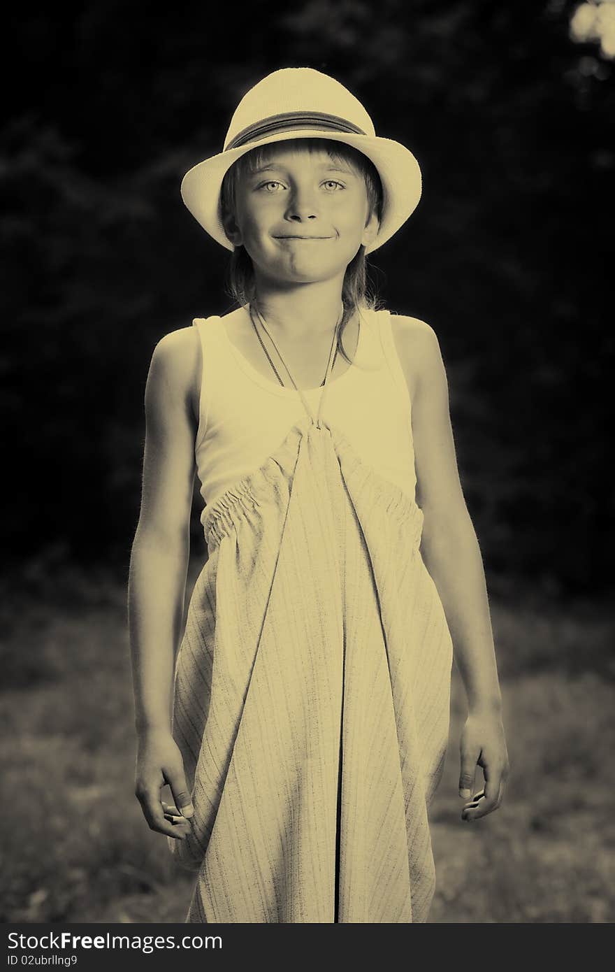 Portrait of a funny smiling boy in a white hat outdoor. Portrait of a funny smiling boy in a white hat outdoor.