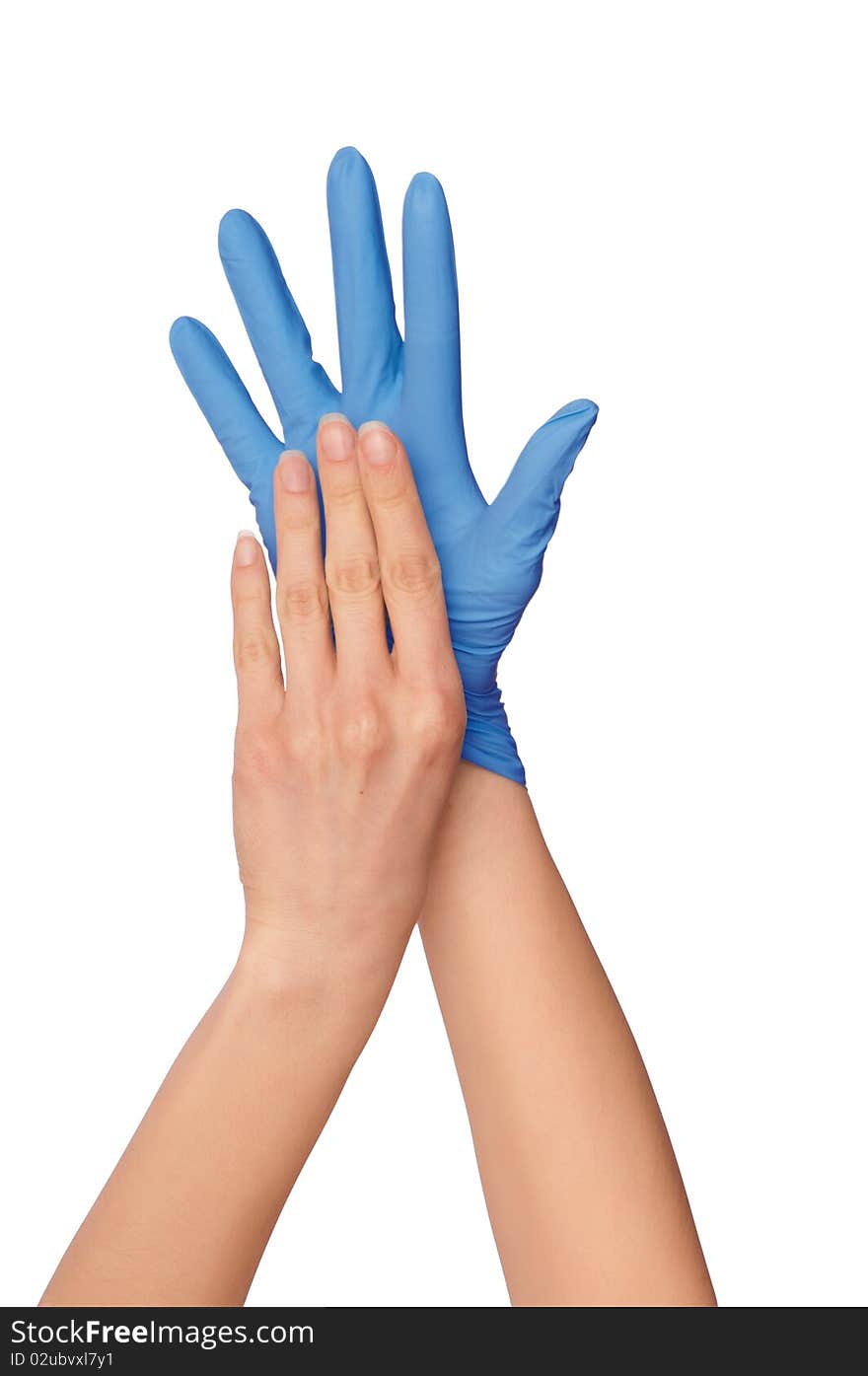 Doctor putting on blue sterilized medical glove for making operation