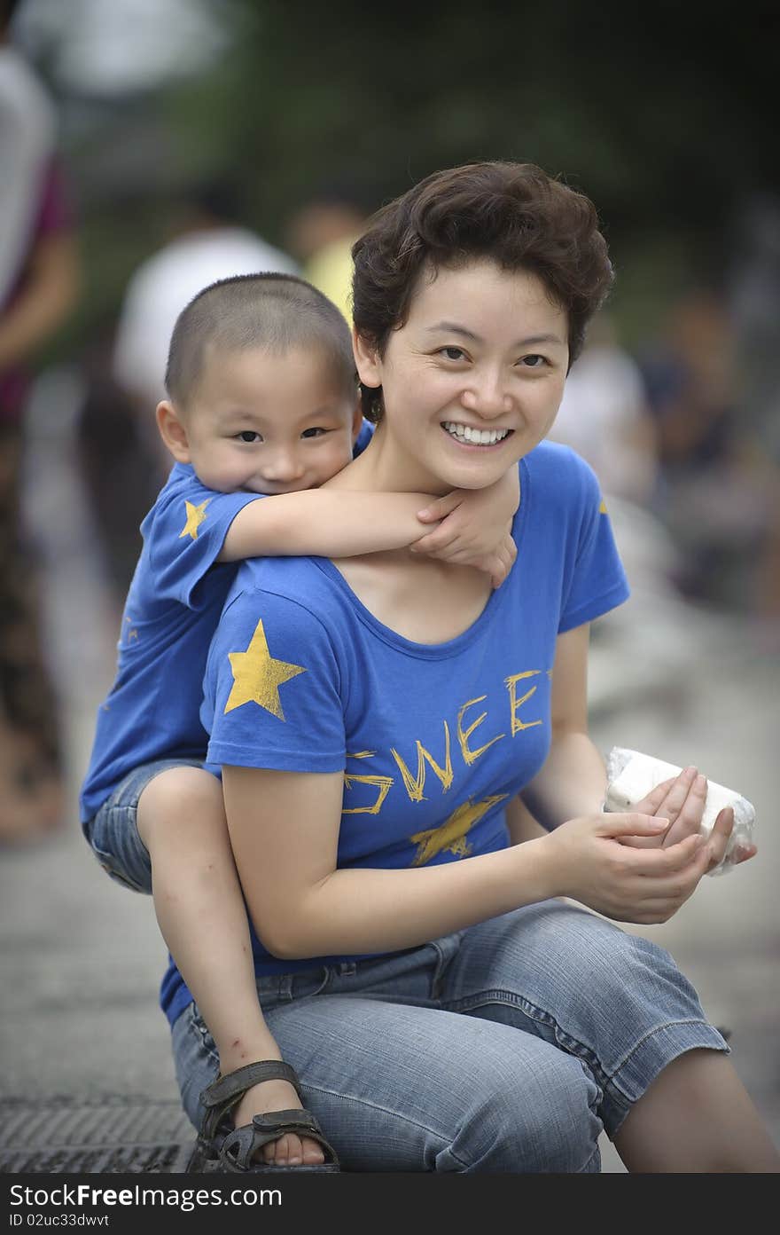 Love in mother and son,in blue.