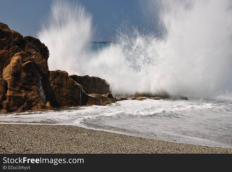 Waves splash in Deiva Marina, Liguria. Waves splash in Deiva Marina, Liguria