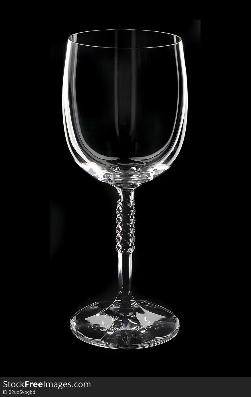 Empty glass isolated on black background. Empty glass isolated on black background