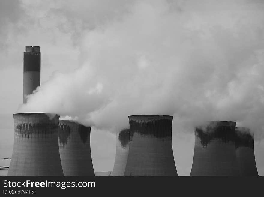 Steam rising from cooling towers at a coal fired power station