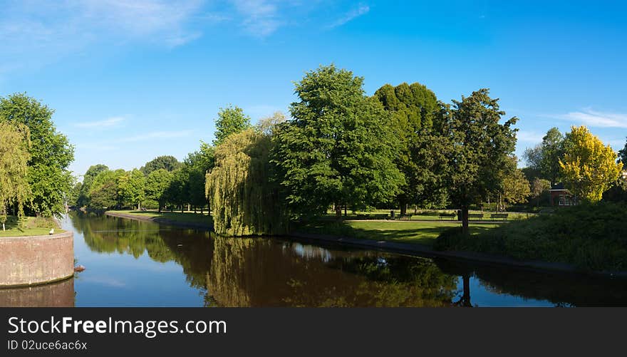 Reflections on a canal in Westerpark, Amsterdam. Reflections on a canal in Westerpark, Amsterdam.