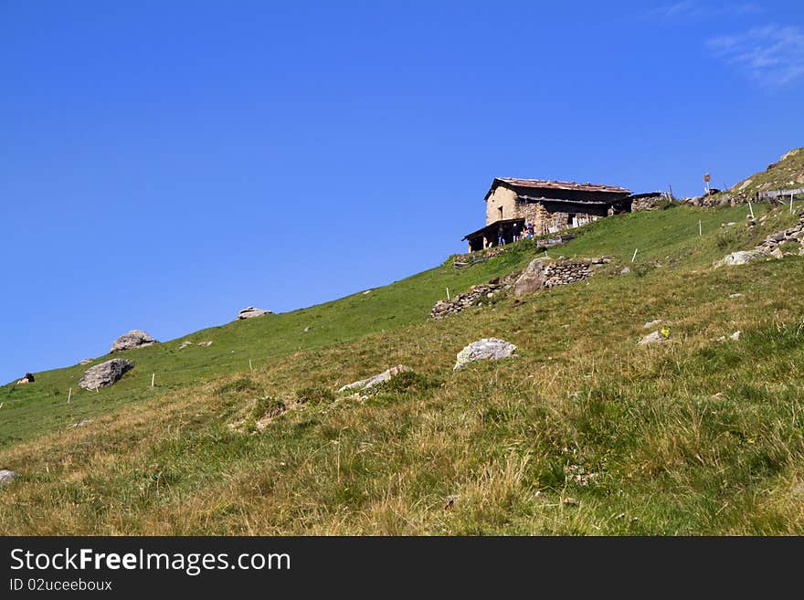 Mountain house in the middle of the lawn. Mountain house in the middle of the lawn